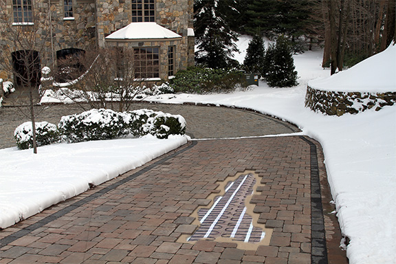 A radiant heated driveway after a snowstorm.