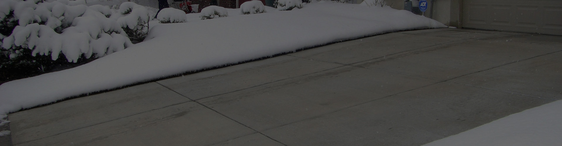 Heated paver driveway banner